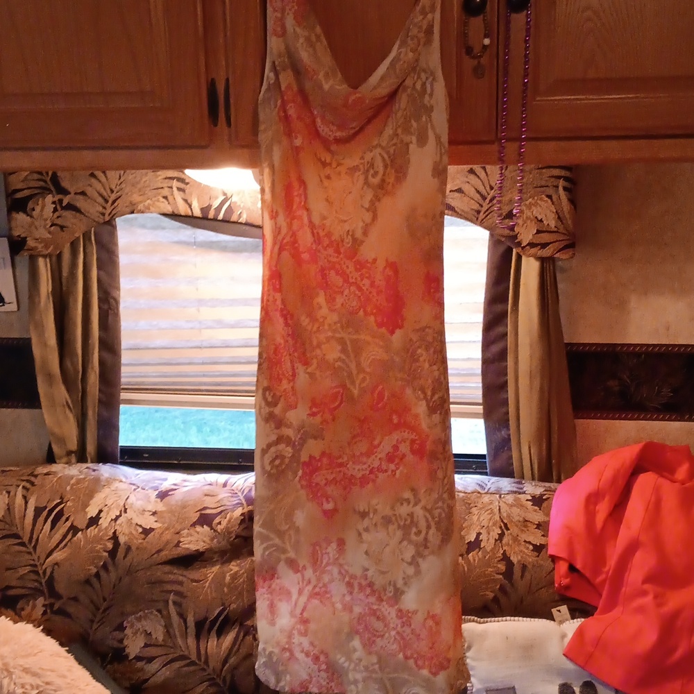 Sleeveless F.L.P. dress size 6 light colors and designs